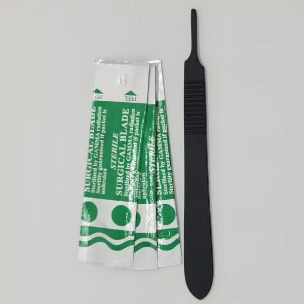 Number three black scalpel handle used for lab work. Displayed with three blades in their packaging.